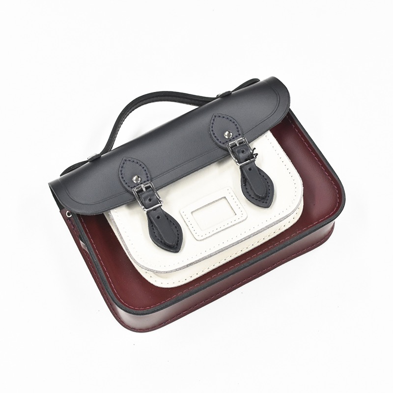 THE CAMBRIDGE SATCHEL CO.